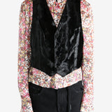 Black top worn by a person, showing the top's fit