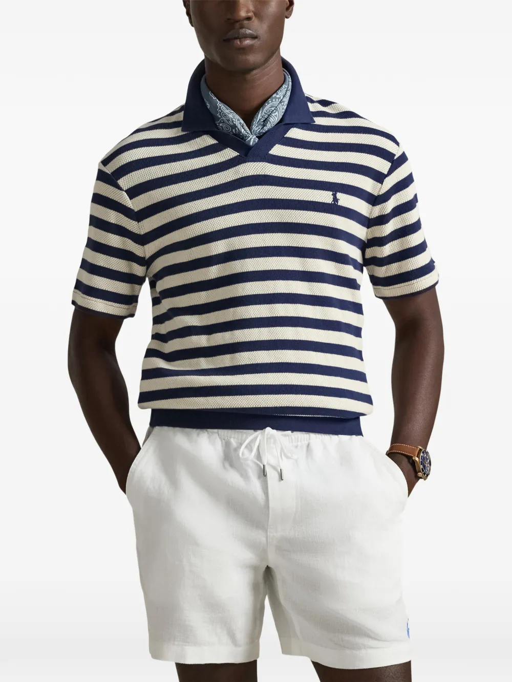 Blue shirt worn by a person, showing the shirt's fit
