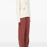 Tan knitwear, full body view