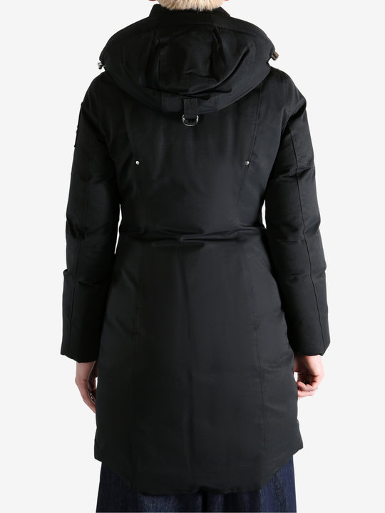 Black jacket worn by a person, showing the jacket fit