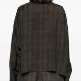 Brown jackets worn by a person, showing the jackets's fit