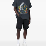 Black t-shirt worn by a person, showing the t-shirt's fit