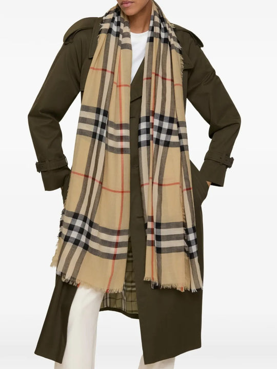 Tan scarf worn by a person, showing the scarf's fit