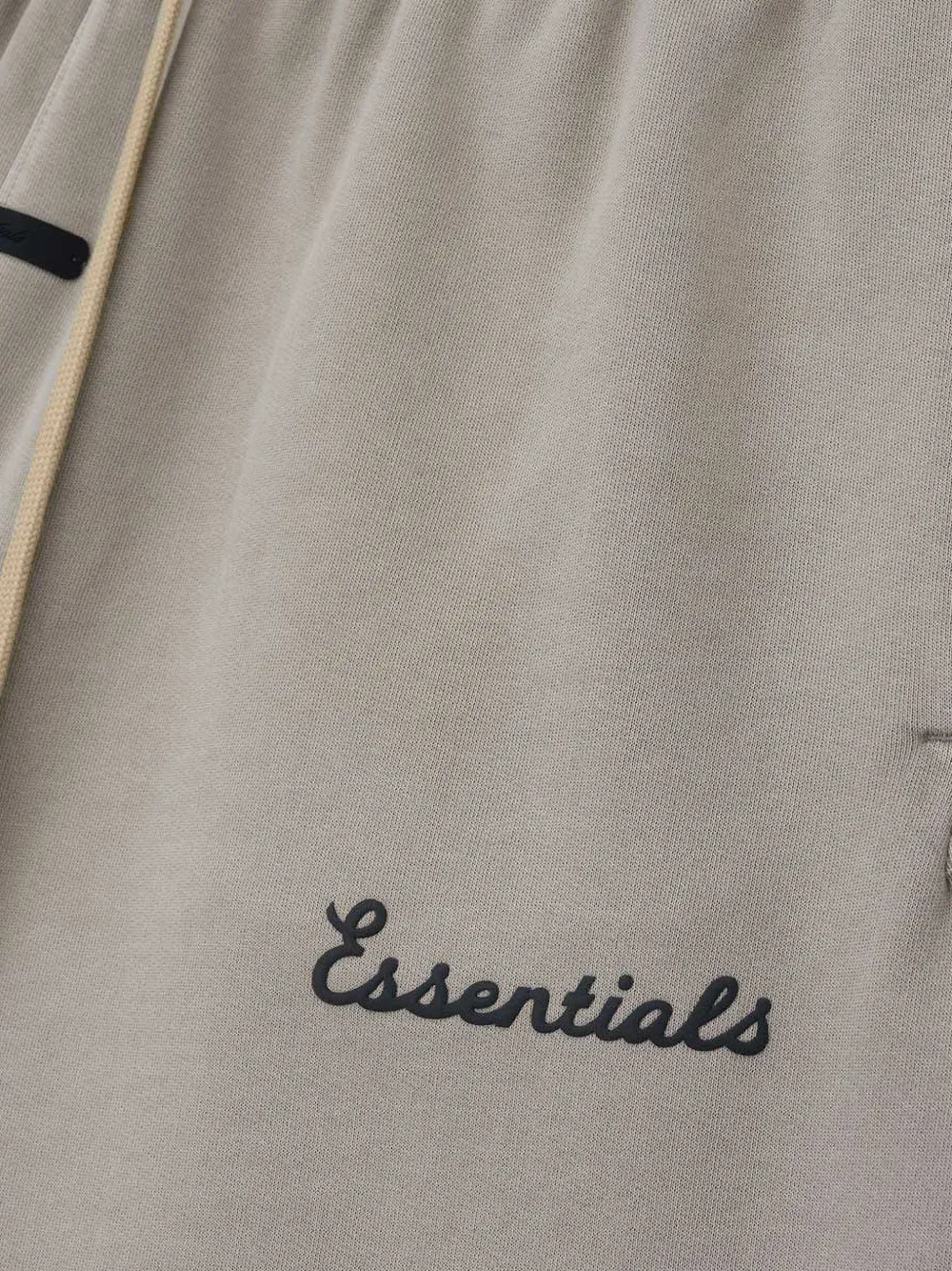 Close up of Grey shorts, showing texture of the cotton fabric