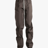 Brown pants worn by a person, showing the pants fit