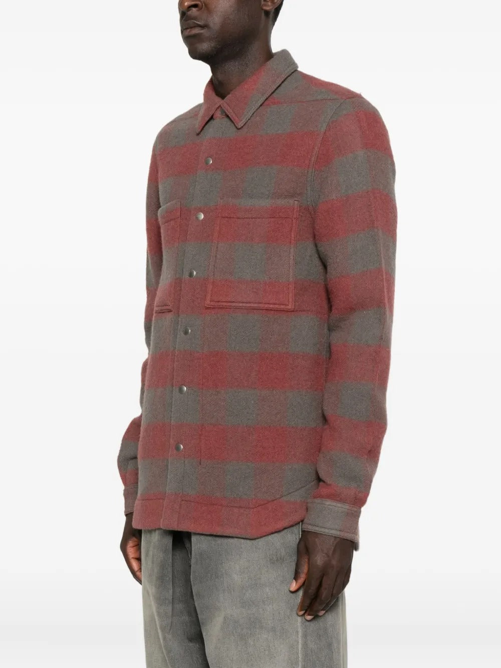 Red shirt worn by a person, showing the shirt's fit