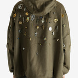 Green sweat worn by a person, showing the sweat fit