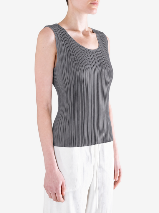 Grey shirt worn by a person, showing the shirt fit