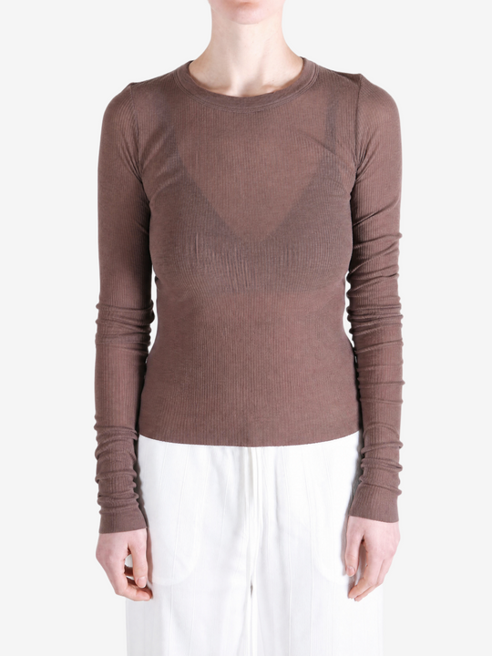 Brown t-shirt worn by a person, showing the t-shirt fit