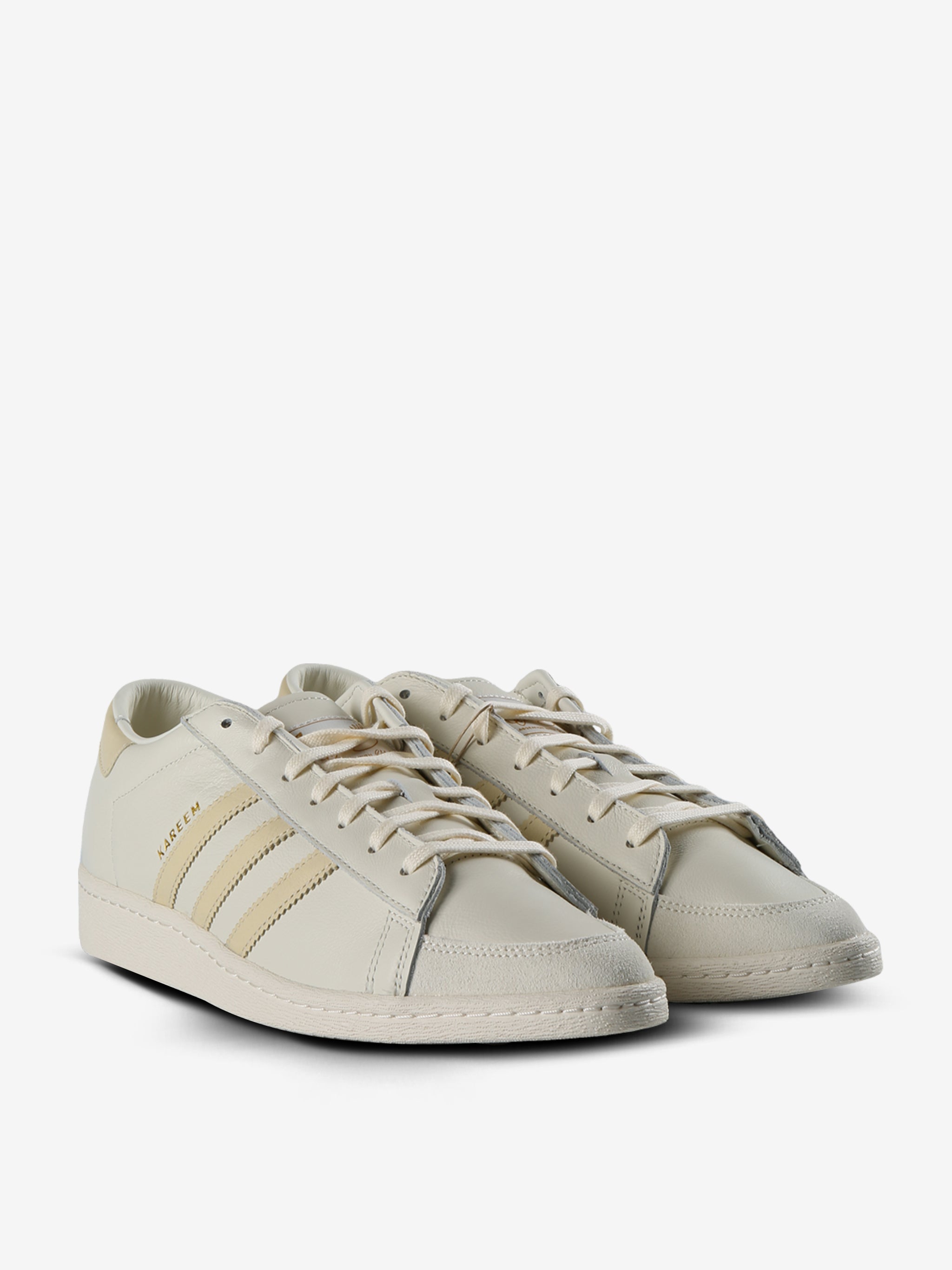 Tan sneakers, side view