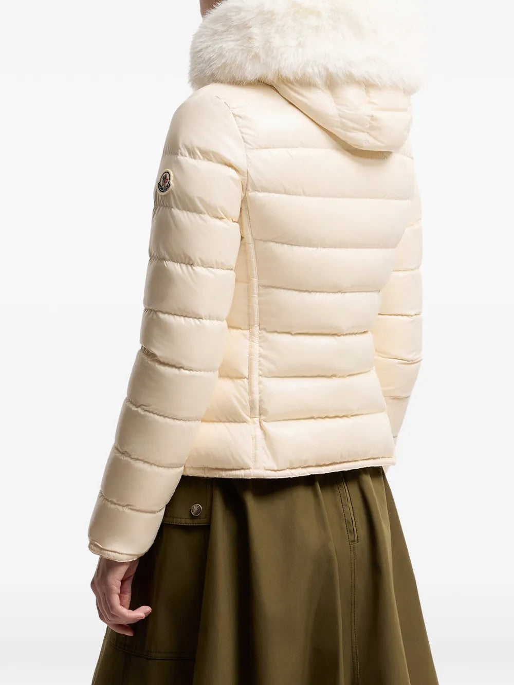 Tan jacket worn by a person, showing the jacket fit