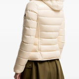 Tan jacket worn by a person, showing the jacket fit