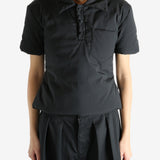 Black t-shirt worn by a person, showing the t-shirt's fit