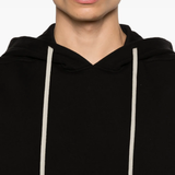 Close up of black sleeveless hoodie,showing texture of the cotton fabric