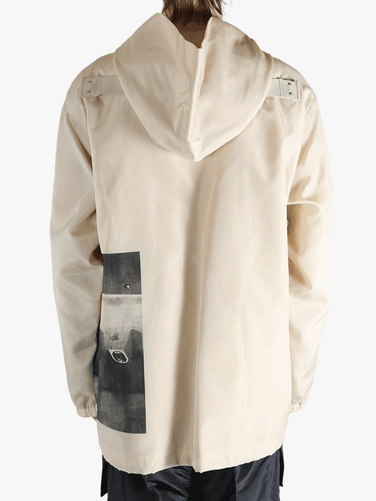 Tan jacket worn by a person, showing the jacket's fit