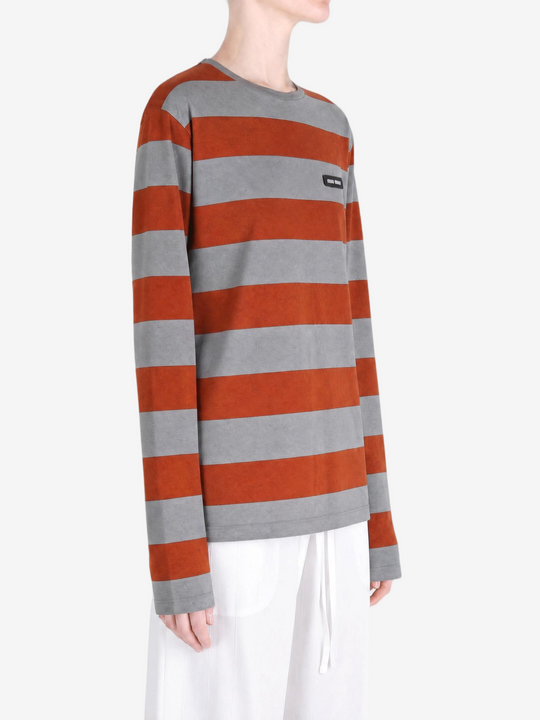 Grey t-shirt worn by a person, showing the t-shirt fit