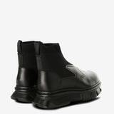 Black boots, back view