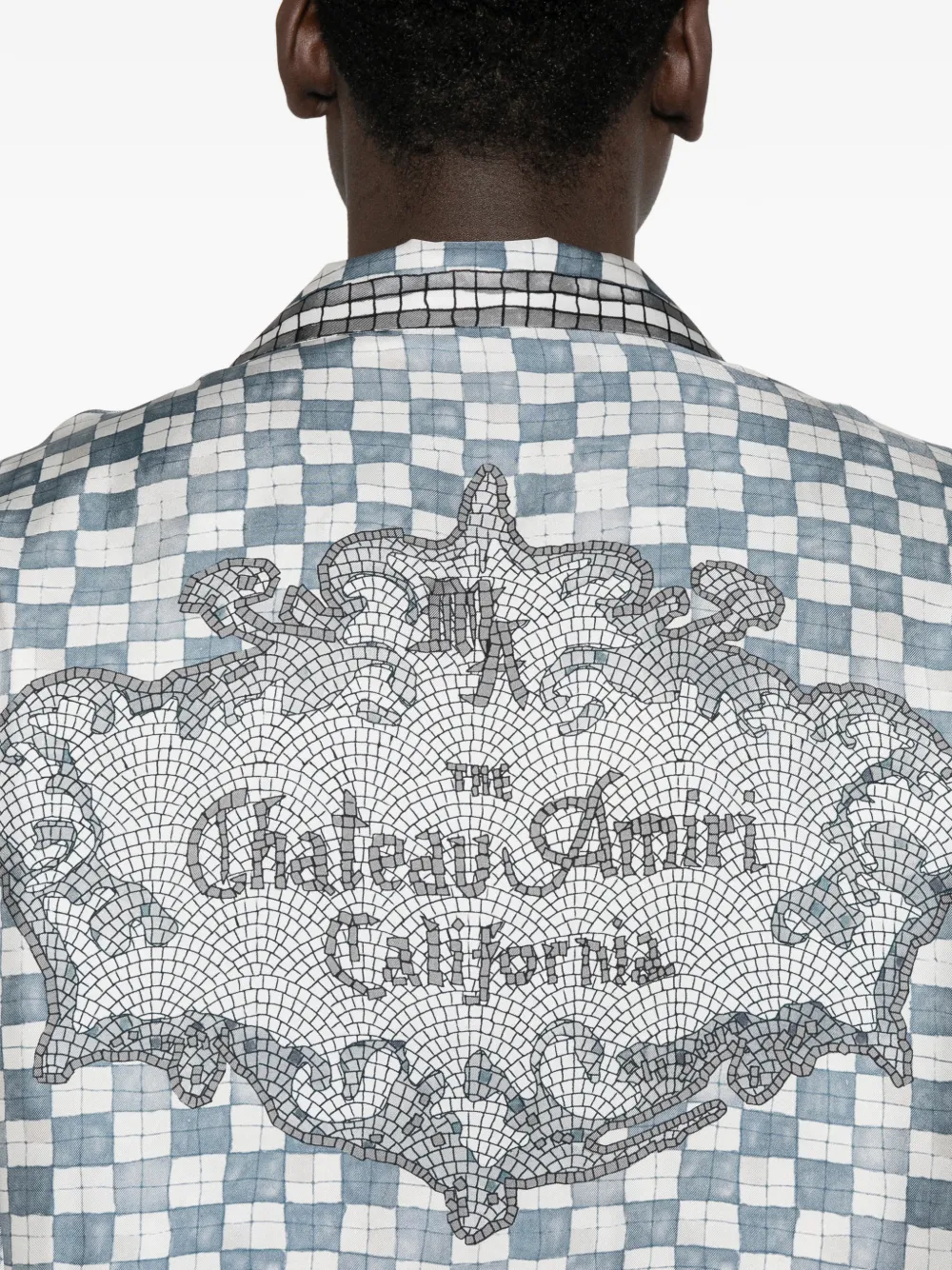 Close up of blue shirt, showing texture of the silk fabric