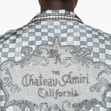 Close up of blue shirt, showing texture of the silk fabric