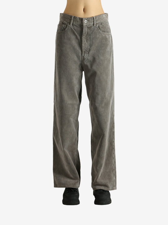 Brown pants worn by a person, showing the pants' fit