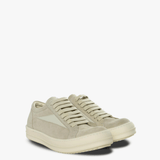 Tan sneakers, side view