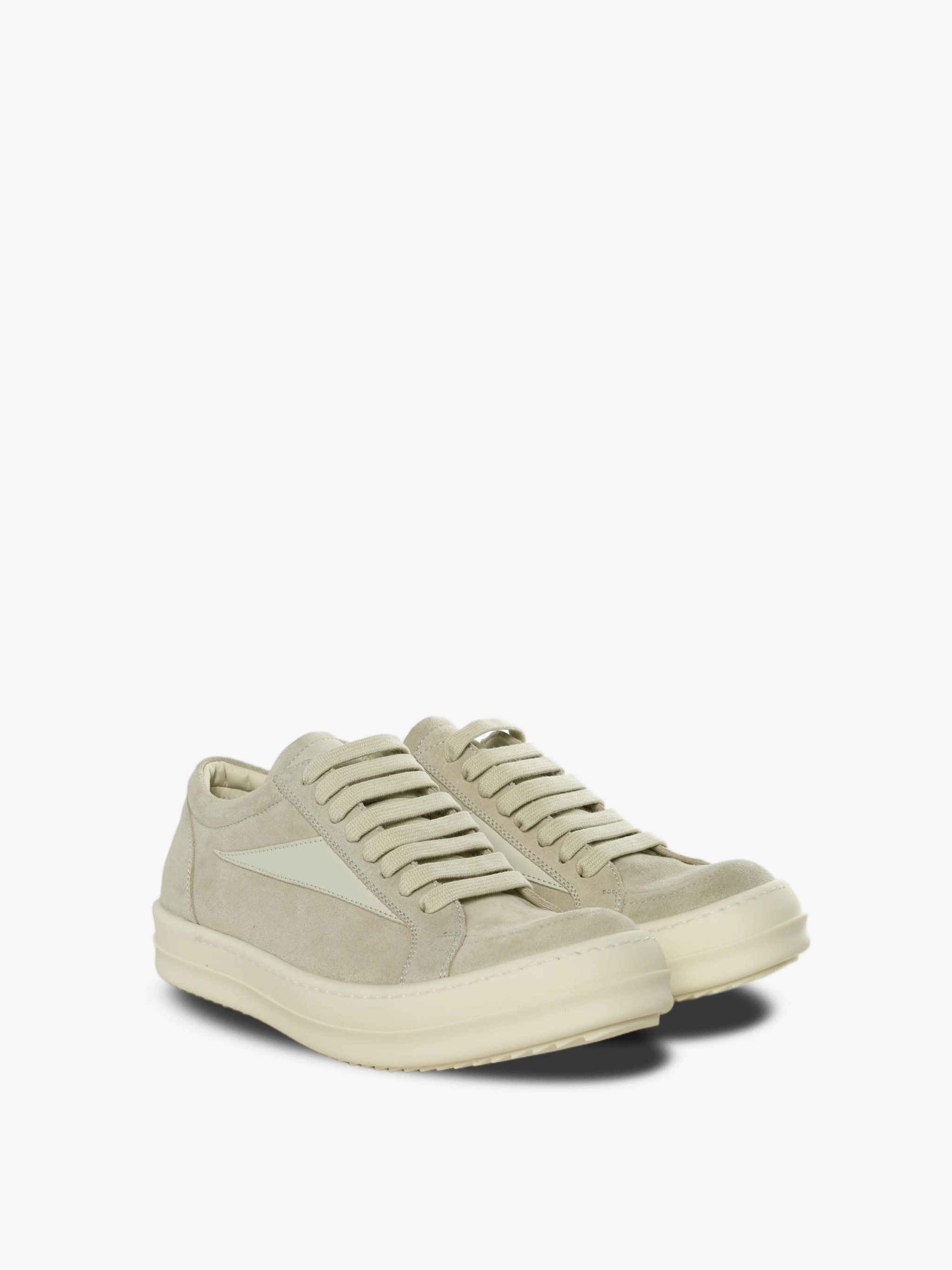 Tan sneakers, side view