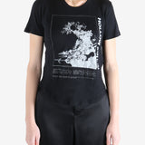 Black t-shirt worn by a person, showing the shirt's fit