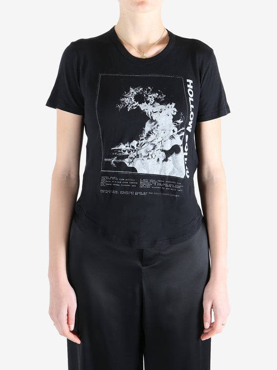 Black t-shirt worn by a person, showing the shirt's fit