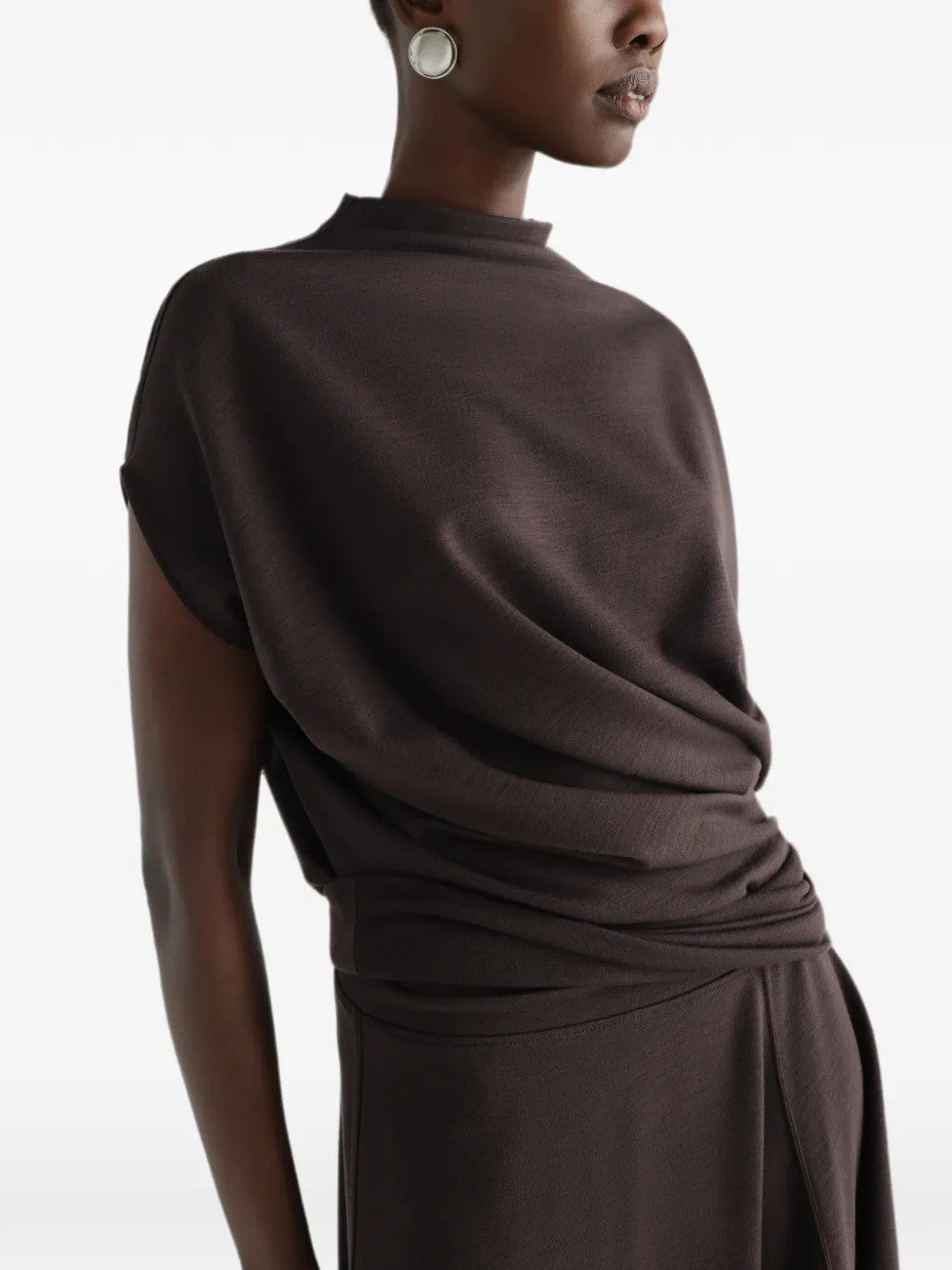 Brown dress worn by a person, showing the dress fit