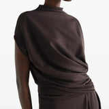 Brown dress worn by a person, showing the dress fit