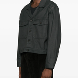 Black jacket  worn by a person, showing the jacket 's fit