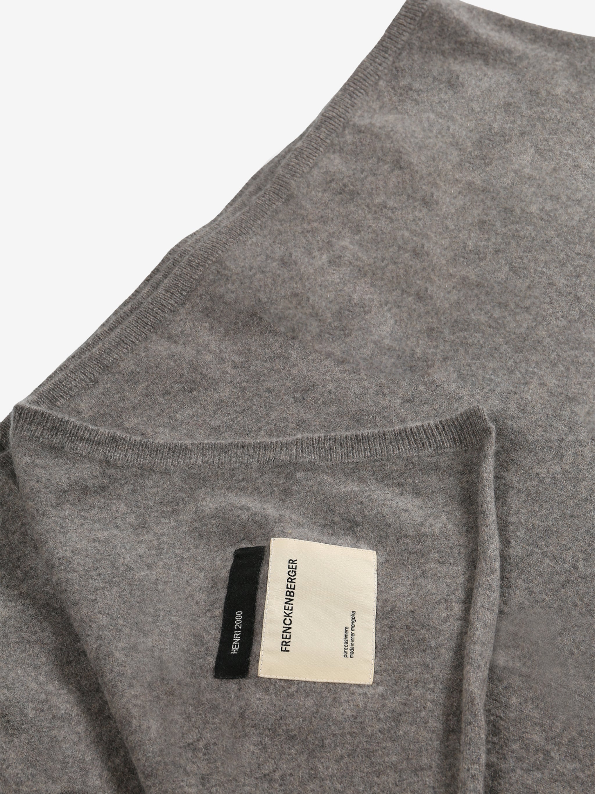 Close up of the brown blanket, showing texture of the fabric