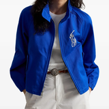 Blue jacket worn by a person, showing the jacket fit