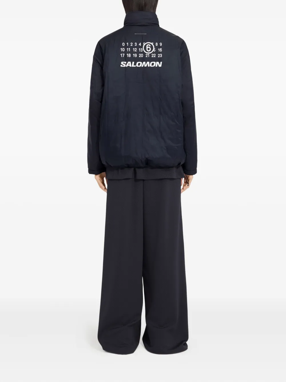 Blue jackets worn by a person, showing the jackets fit