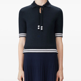 navy t-shirt worn by a person, showing the t-shirt fit