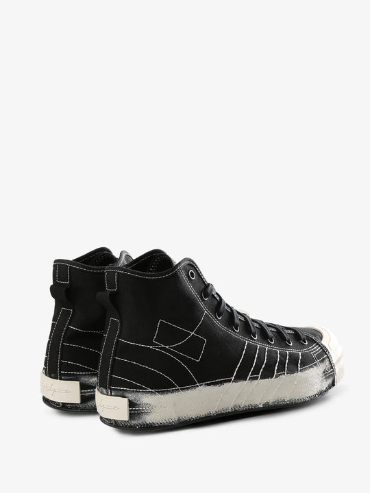 Black sneaker, back view