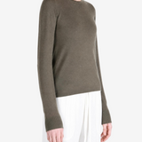 Brown t-shirt worn by a person, showing the t-shirt fit