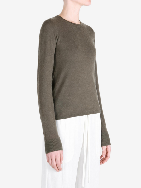 Brown t-shirt worn by a person, showing the t-shirt fit