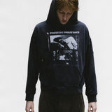 Black hoodies worn by a person, showing the hoodies fit