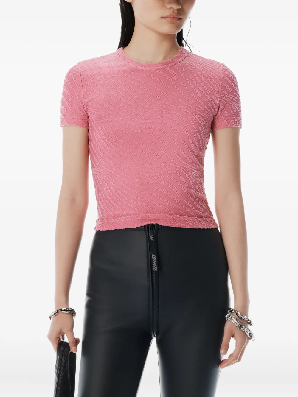 Pink top worn by a person, showing the top fit