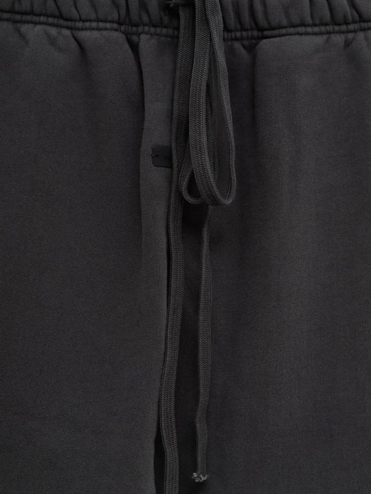 Close up of the grey pants, showing texture of the cotton fabric