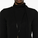 Close up of black tops, showing texture of the cotton fabric
