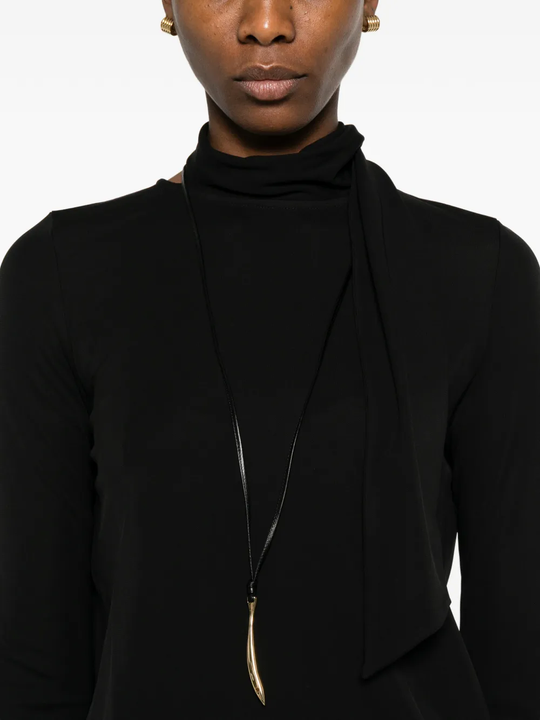Close up of black tops, showing texture of the cotton fabric