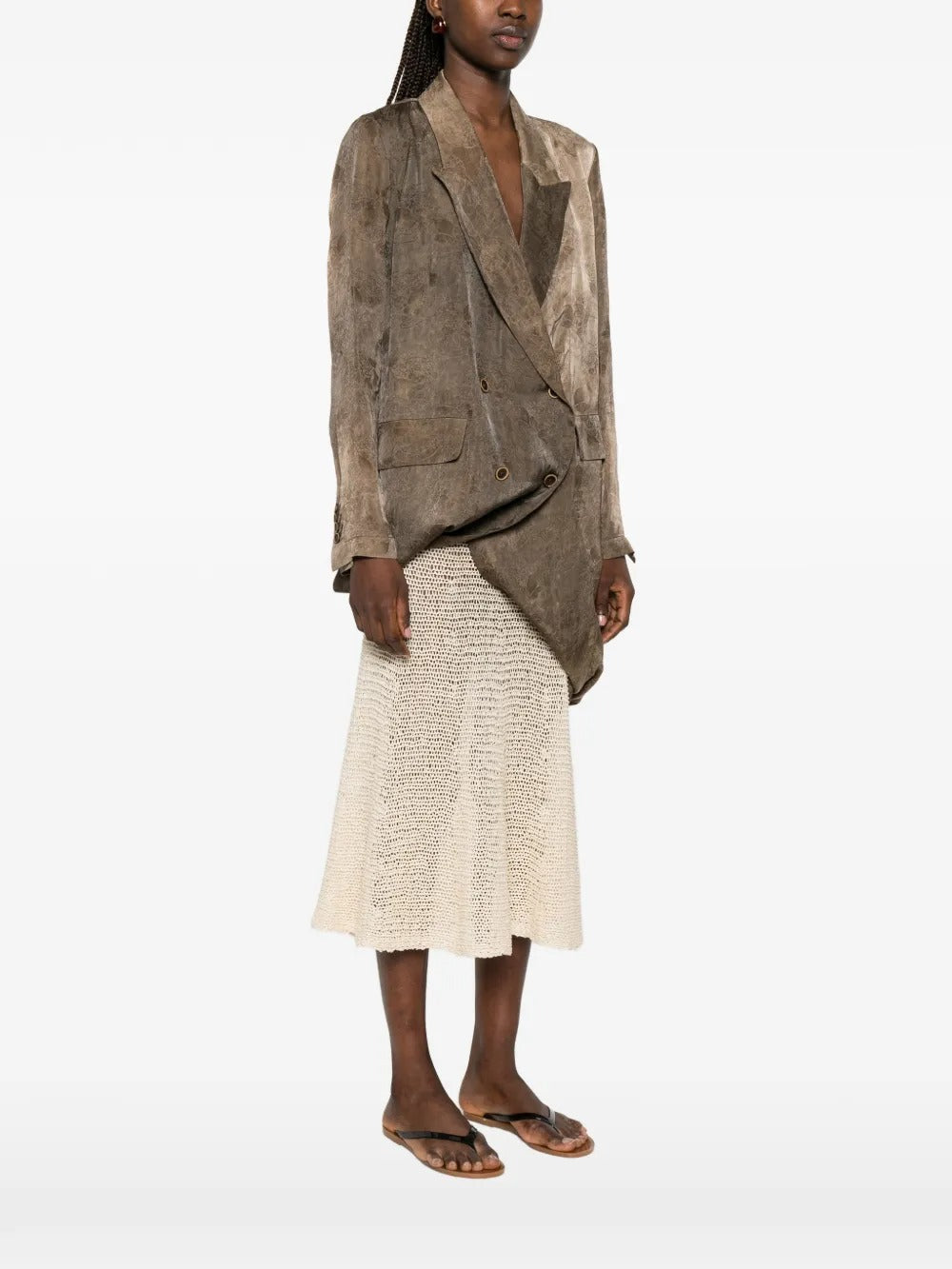 Brown jacket worn by a person, showing the jacket's fit 