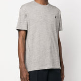 Grey shirt worn by a person, showing the shirt fit