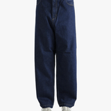 Blue pant worn by a person, showing the pant's fit