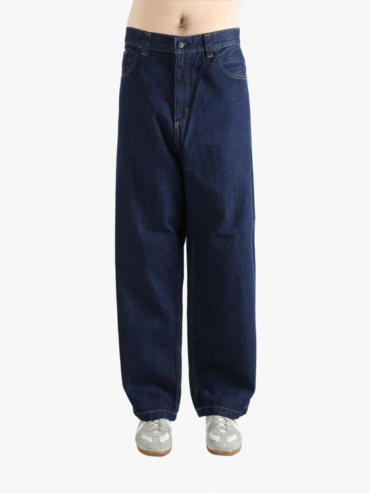 Blue pant worn by a person, showing the pant's fit