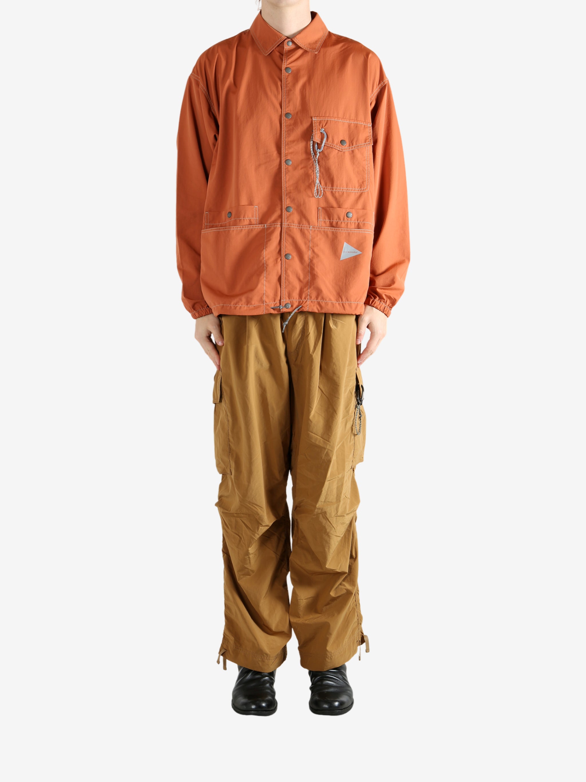 Orange jacket, full body view