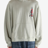 Grey hoodie worn by a person, showing the hoodie's fit