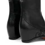Close up of black boot, showing texture of the Calf Leather fabric